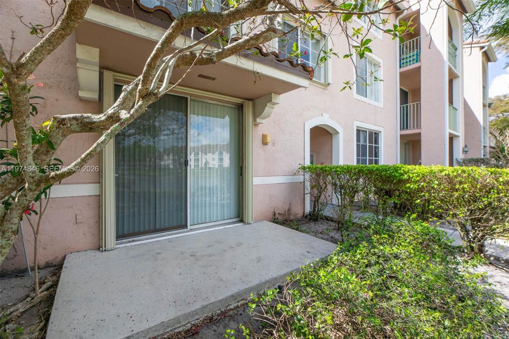 Photo of 12154 Saint Andrews Pl #110, Miramar, FL 33025 (MLS # A11974846)