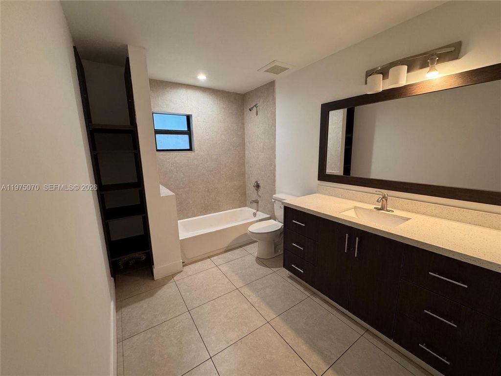 Photo of 605 NW 3rd Ave #A-B, Hallandale Beach, FL 33009 (MLS # A11975070)