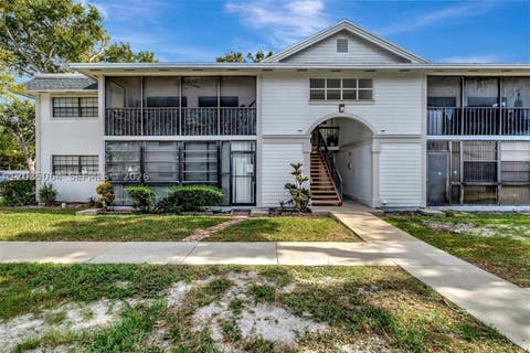Photo of 18965 NW 62nd Ave #210, Hialeah, FL 33015 (MLS # A12035064)