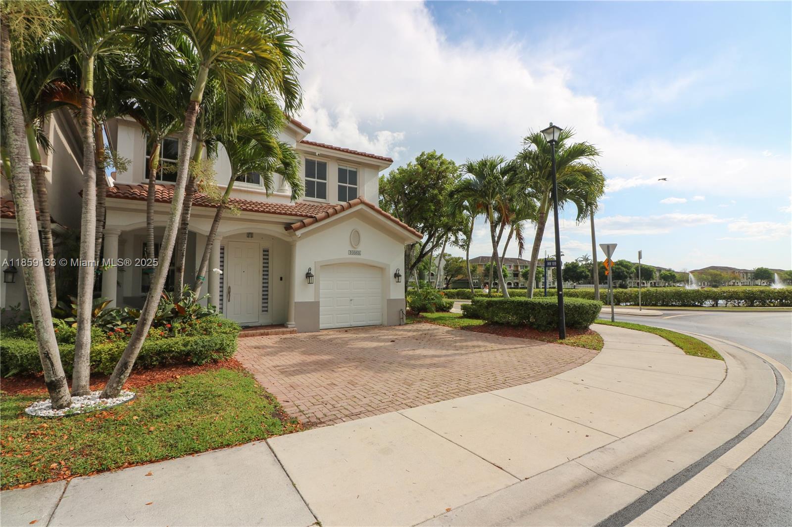 Fully remodeled 5-bedroom, 4-bath private corner home in the highly sought-after Islands at Doral community. Features a 1-car garage, 3 additional parking spots, and abundant natural light. Four bedrooms upstairs including the master, plus one bedroom and full bath on the first floor. Upgraded kitchen with Whirlpool appliances, remodeled bathrooms, and new floors throughout. Fully covered and gated backyard patio with direct lake views. Solar panels help reduce utility costs. Residents enjoy 2 community clubhouses with pools, spa, gym, and tennis courts. Top-rated school district, close to shopping, dining, highways, airport, and 30 minutes to the beach. Available for immediate move-in after HOA approval.