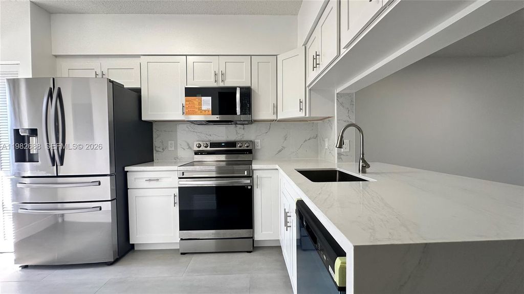 Photo of 16769 Hemingway Dr, Weston, FL 33326 (MLS # A11982688)