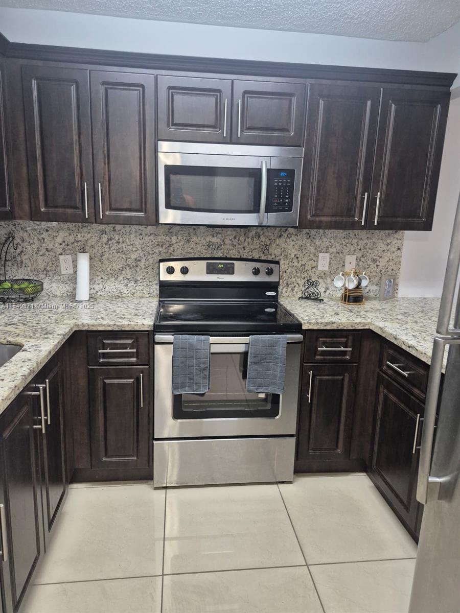 Beautifully Remodeled 1-bedroom, 1- bathroom Apartment in Hialeah, This fully renovated first floor unit offers modern comfort and convenience in a prime Hialeah location. Enjoy stylish Kitchen featuring stainless steel appliances and granite counter tops, along with sleek tile flooring throughout the apartment. The spacious bedroom includes a walk-in closet, and the unit comes equipped with an in-unit washer and dryer for your convenience.
