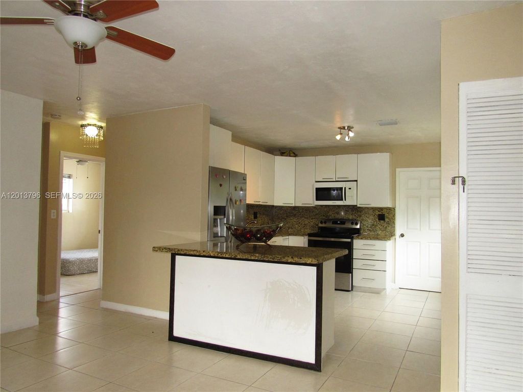 Photo of 1390 SW 34th Ave, Fort Lauderdale, FL 33312 (MLS # A12013796)