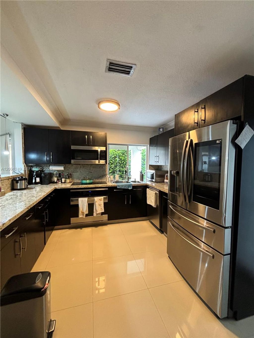 Photo of 1351 Garden Rd, Weston, FL 33326 (MLS # A12006249)