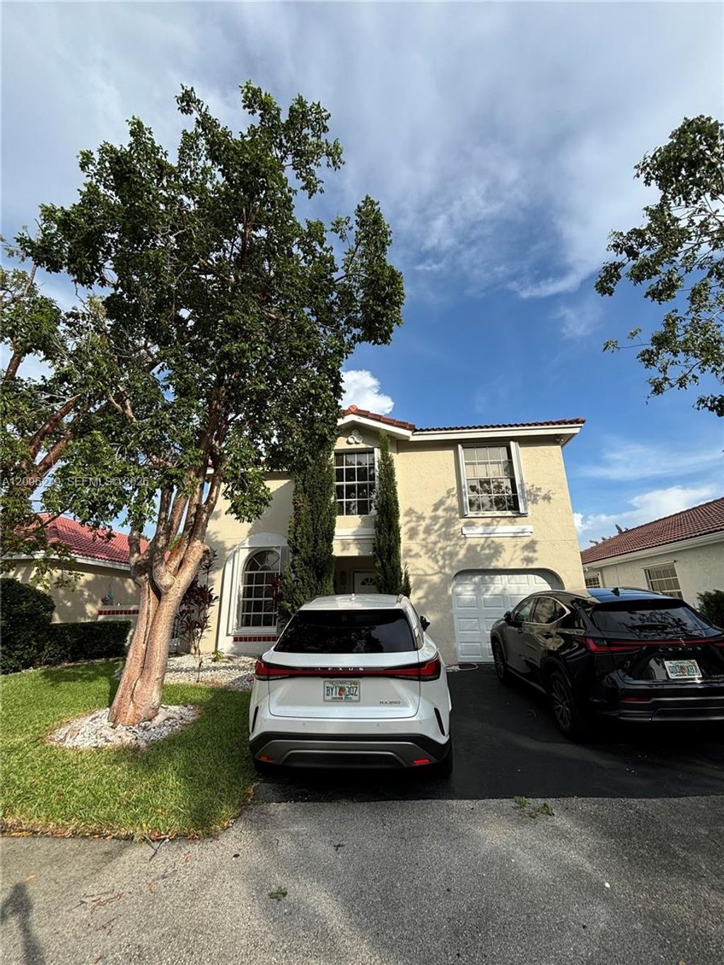 Photo of 1351 Garden Rd, Weston, FL 33326 (MLS # A12006249)