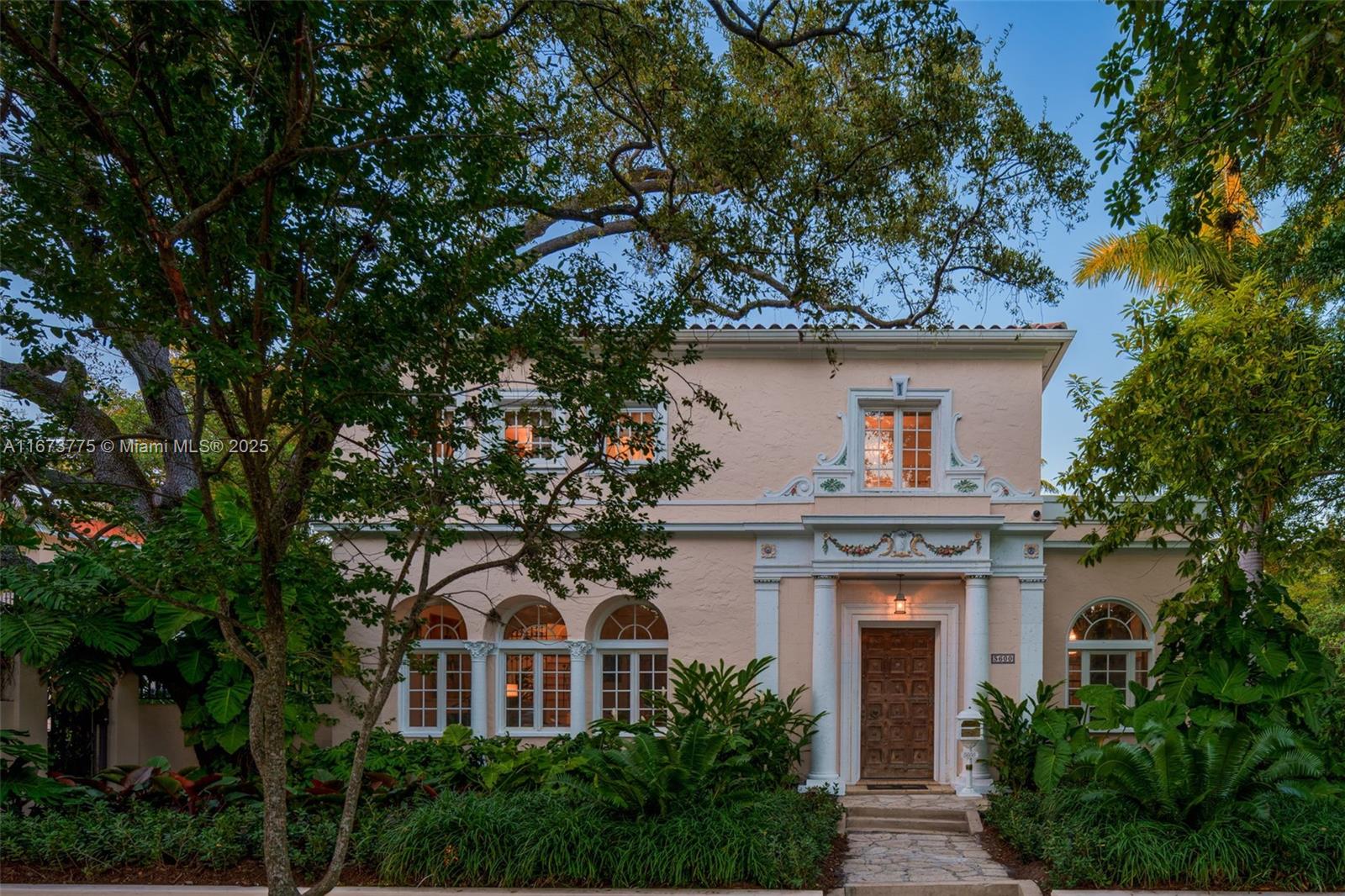 Experience the elegance of this fully renovated 6,953 (total) SF “smart” landmark estate in the exclusive guard-gated community of Morningside. Situated on a sprawling 18,922 SF corner lot, this bright residence beautifully merges historic charm with modern living. Featuring soaring pecky cypress ceilings, stately archways, & custom tilework. The home includes 5 bedrms, 3 dens, 5.5 baths, a stunning atrium, gourmet open gas kitchen, man-cave, & library. Enjoy the expansive outdoor area with a poolside pavilion, summer kitchen, playground, koi pond, & a 2-story guest house (built in 2019) with 2 bedrms, spa-like baths, sauna, & cold plunge. No flood zone (FLOOD ZONE X). Additional offerings: gas generator, solar panels & smart home & security system.