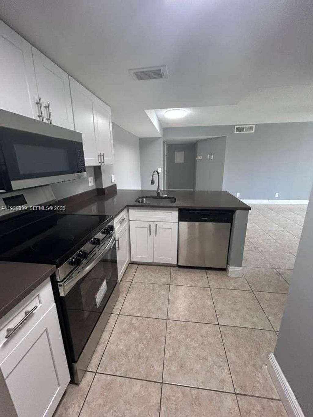 Photo of 10757 Cleary Blvd #206, Plantation, FL 33324 (MLS # A11929839)