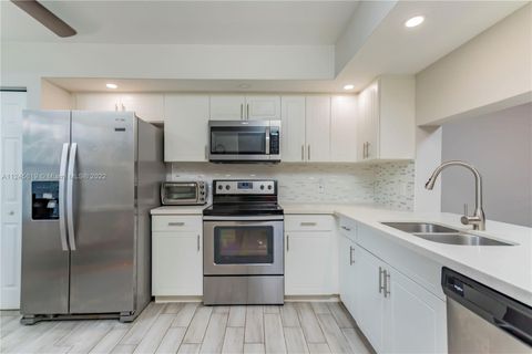 Photo of 1501 SW 131st Way #104P, Pembroke Pines, FL 33027 (MLS # A11245619)