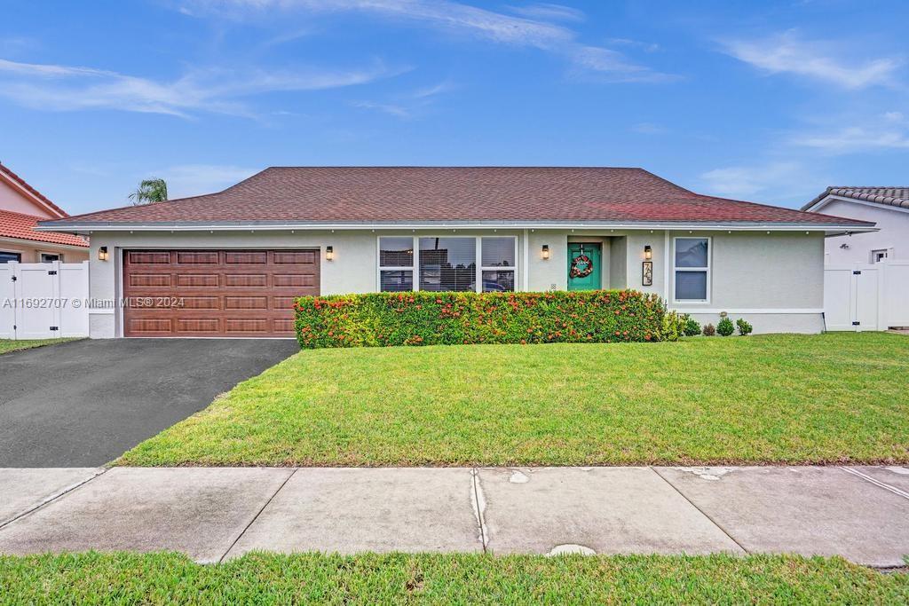 Your Dream Home Awaits – Submit Your Offer by 1/29/2025!
This beautifully updated home is in a sought-after, quiet neighborhood on the outskirts of Coral Springs. With no HOA and minimal traffic, it’s perfectly situated minutes from parks, shops, restaurants, golf courses, and entertainment. The open-concept design features 3 bedrooms, 2 bathrooms, and a water view. You’ll find a spacious kitchen, a dedicated laundry room, and a 2-car garage. Covered patio, fenced backyard with water access, and included outdoor cameras. This home is storm-ready with hurricane-impact windows and doors, plus a generator plug. Recent updates include all the above plus fresh interior/exterior paint, flooring, modern light fixtures, doors, and baseboards. Make this property yours before it’s gone!