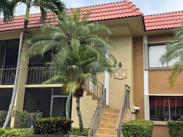 Photo of 301 Lakeview Dr #102, Weston, FL 33326 (MLS # A12065846)