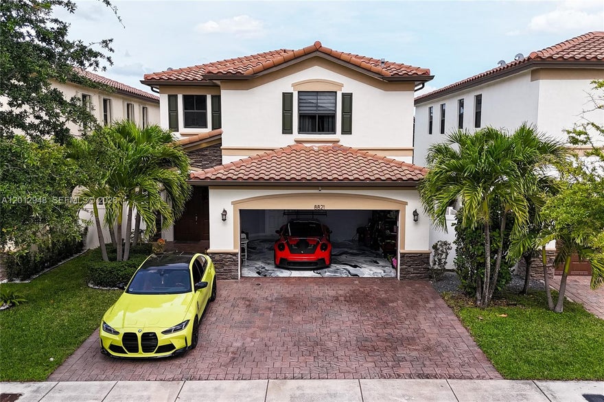 Stunning modern 3-bedroom, 2.5-bathroom single-family home built in 2013, located in the highly desirable Aragon community in Hialeah. This beautifully maintained property features a sleek open-concept layout with high-end finishes throughout.
The gourmet kitchen offers quartz countertops, custom cabinetry, stainless steel appliances, and a spacious kitchen peninsula perfect for entertaining and additional seating. Enjoy elegant porcelain flooring, abundant natural light, and a contemporary design that flows seamlessly into the living and dining areas.

Upstairs, you’ll find spacious bedrooms including a comfortable primary suite, while a convenient half bath is located on the first floor. The home also features a stylishly upgraded garage with epoxy flooring for a clean, modern look.

Step outside to a private backyard oasis with a paved patio, ideal for outdoor gatherings, complete with privacy fencing and tropical landscaping.

Located in the sought-after Aragon community, residents enjoy a well-maintained neighborhood and convenient access to major highways, shopping centers, and schools. Move-in ready and a must-see!