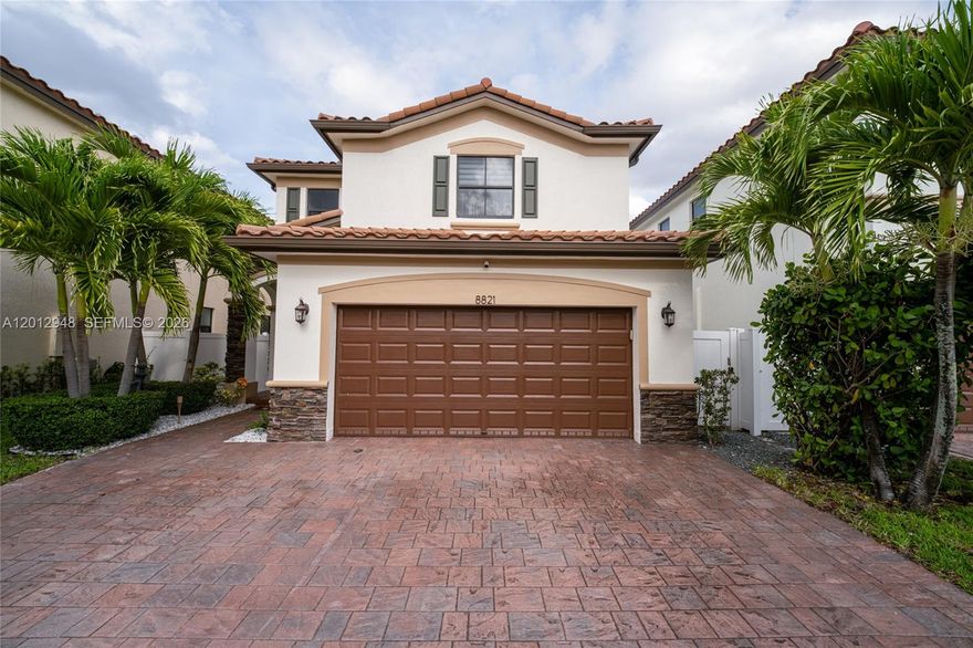 Stunning modern 3-bedroom, 2.5-bathroom single-family home built in 2013, located in the highly desirable Aragon community in Hialeah. This beautifully maintained property features a sleek open-concept layout with high-end finishes throughout.
The gourmet kitchen offers quartz countertops, custom cabinetry, stainless steel appliances, and a spacious kitchen peninsula perfect for entertaining and additional seating. Enjoy elegant porcelain flooring, abundant natural light, and a contemporary design that flows seamlessly into the living and dining areas.

Upstairs, you’ll find spacious bedrooms including a comfortable primary suite, while a convenient half bath is located on the first floor. The home also features a stylishly upgraded garage with epoxy flooring for a clean, modern look.

Step outside to a private backyard oasis with a paved patio, ideal for outdoor gatherings, complete with privacy fencing and tropical landscaping.

Located in the sought-after Aragon community, residents enjoy a well-maintained neighborhood and convenient access to major highways, shopping centers, and schools. Move-in ready and a must-see!