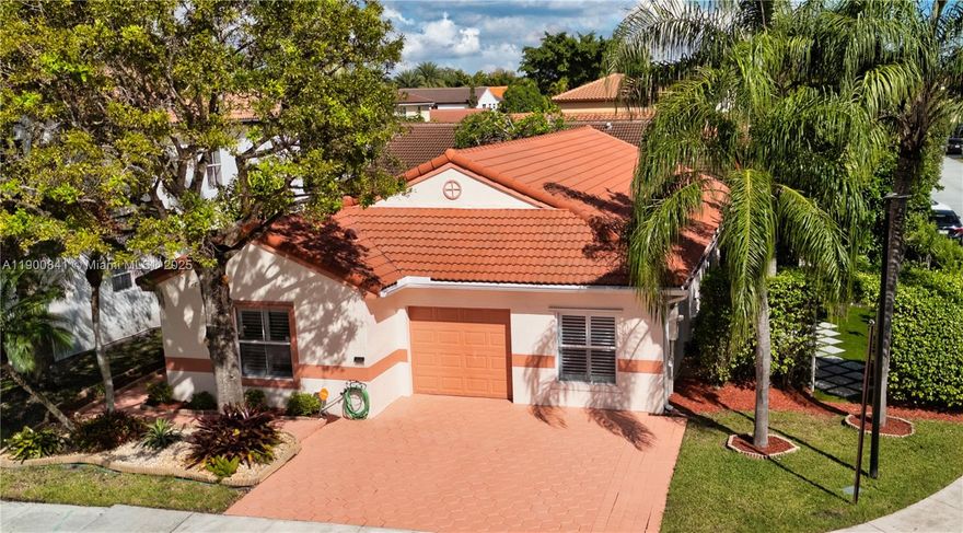 Welcome to your private retreat in the heart of Pembroke Pines. This rare 4-bed 2-bath home sits on a corner lot surrounded by lush, mature trees. The open layout features a spacious living room and a large eat-in kitchen ideal for family meals and entertaining. Enjoy the convenience of a 1-car garage and the peace of mind that comes with a brand-new a/c system. Located in a family-friendly community perfect for evening walks and weekend bike rides, this neighborhood offers the kind of lifestyle families dream of with top-rated schools just minutes away.