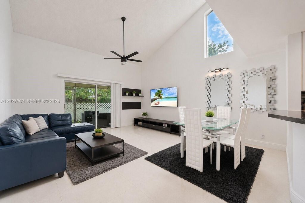 Photo of 15723 Woodgate Pl #E, Sunrise, FL 33326 (MLS # A12027803)