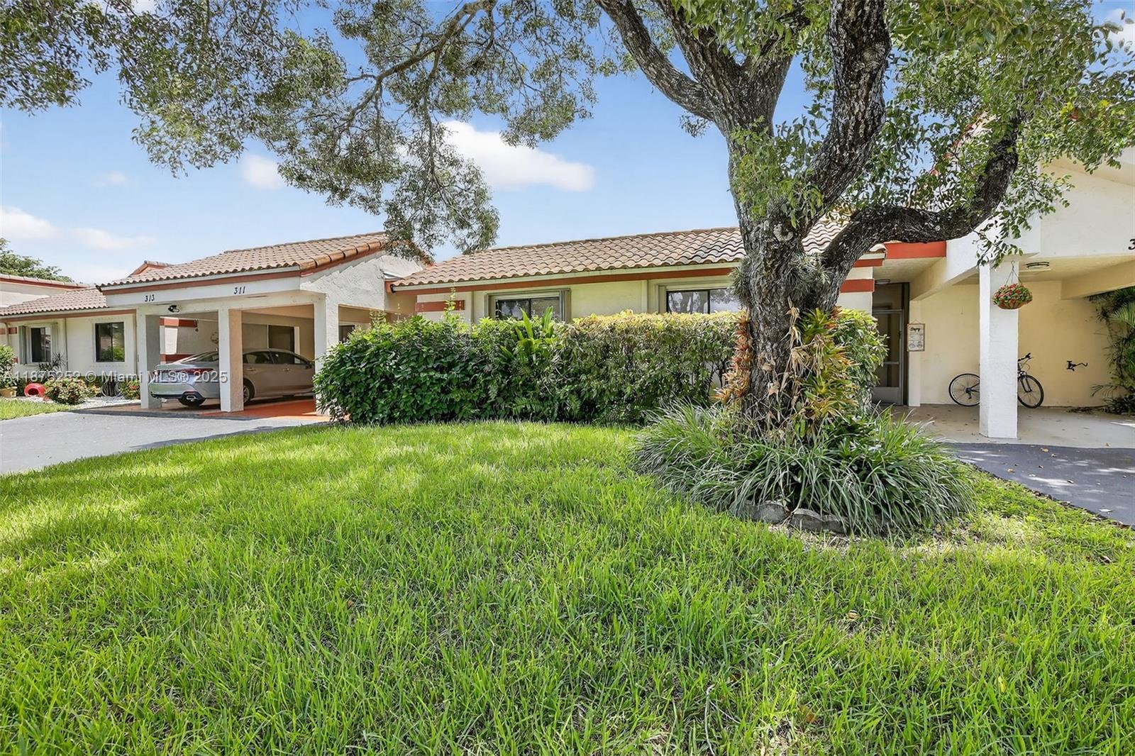 Amazing 3/2 lakefront villa offers all tile flooring, updated kitchen and baths, a private atrium and huge screened patio overlooking the sparkling water. Kitchen boasts stainless steel appliances and granite countertops. Fantastic location close to Weston, tucked away in single family home neighborhood. HOA includes water, lawn, building ext., etc. and amenities include pool, tennis and basketball. What a perfect place to enjoy, entertain, and watch nature in your own backyard. Bright and airy, freshly painted and ready to go!