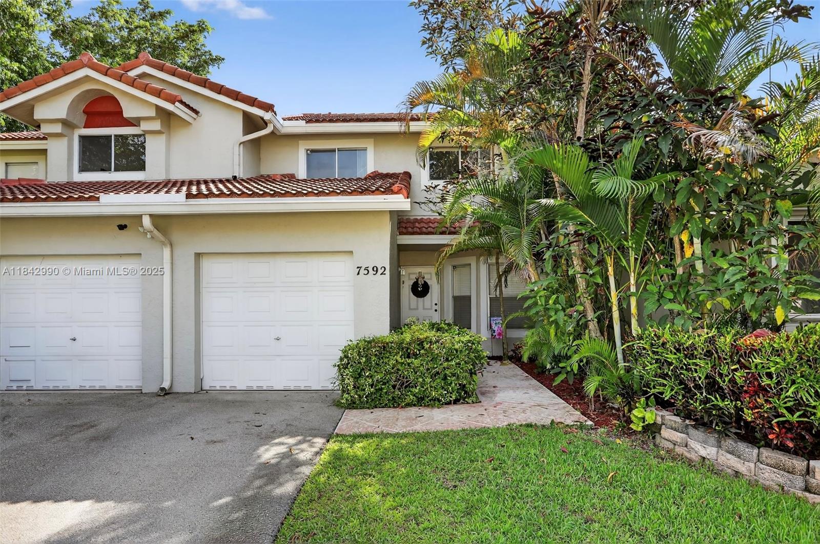 Welcome home to this absolutely charming 3 bedroom, 2.5 bathroom townhouse offering a spacious 4th bedroom option by way of a loft with walk-in closet! Situated in North Margate boarding Coral Springs in the community of Fairway Views, this property is conveniently located, close to great shopping, dining & I75/Turnpike. Featuring over 1750 sqft of living area, a 1-car garage, soaring volume ceilings, a light & bright floor plan, undated eat-in kitchen, ample closet space, updated laminate flooring & more! Primary bedroom & en-suite with spacious walk-in closet with built-ins are conveniently located on the ground level as well as an updated half bathroom for guests. HOA includes exterior building insurance & roof repairs, landscaping, Gym, Pool & updated Club room. Do not miss this one!
