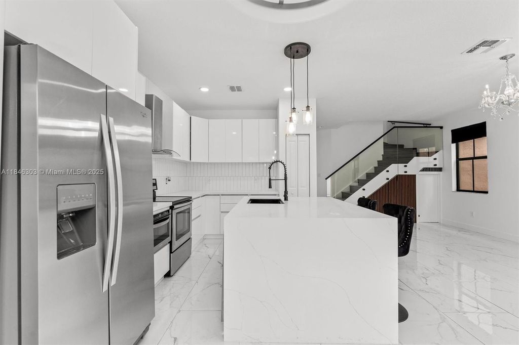 Photo of 4814 NW 56th Ct, Tamarac, FL 33319 (MLS # A11846303)