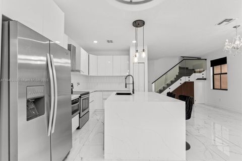 Photo of 4814 NW 56th Ct, Tamarac, FL 33319 (MLS # A11846303)