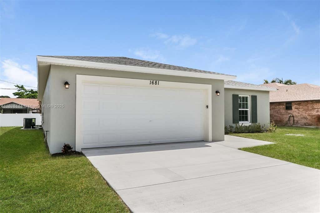 Photo of 1681 SE Mariner Ln, Port St Lucie, FL 34983 (MLS # A11838144)