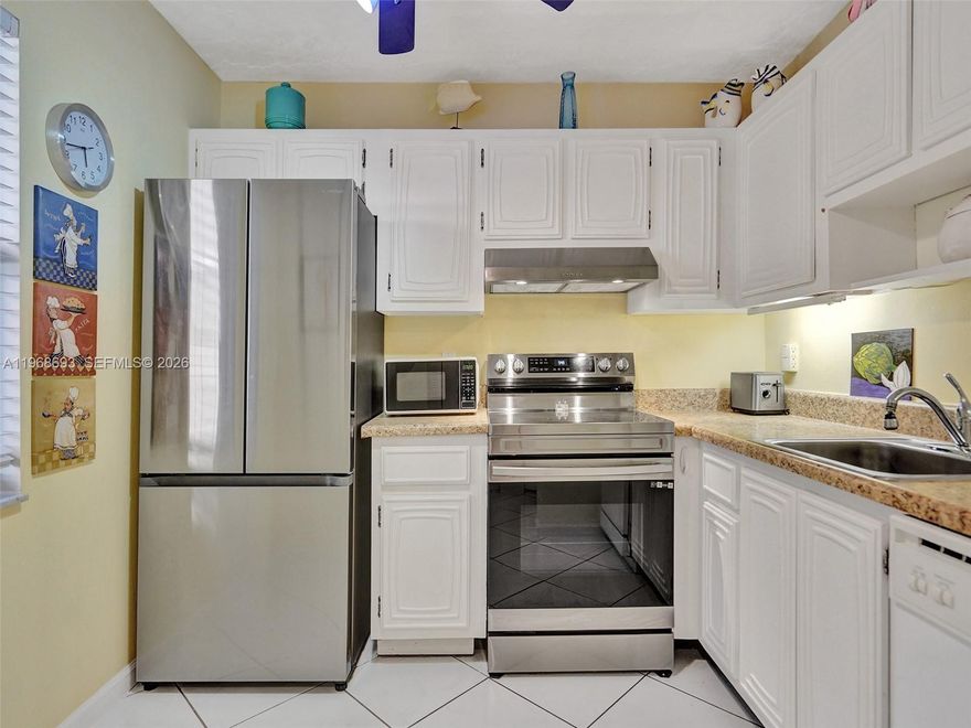 BEAUTIFUL corner unit with 2 bedrooms and 2 bathrooms with IMPACT WINDOWS BUT also IMPACT SLIDING DOORS WOW! White kitchen, TILE FLOOR throughout, this one will sell FURNISHED and TURNKEY, ready to go. Large screened patio accessible from the living room and from the master bedroom. THE Somerset Phase 1 is a great GATED COMMUNITY with a pool, BBQ area, billiard room, gym, shuffleboard and more. LOW MAINTENANCE FEES. Close to the malls and restaurants.. Only 6 MILES TO THE BEACH. Comes with one PARKING space and 1 STORAGE. No rental for 3 years, HURRY UP, WON'T LAST!