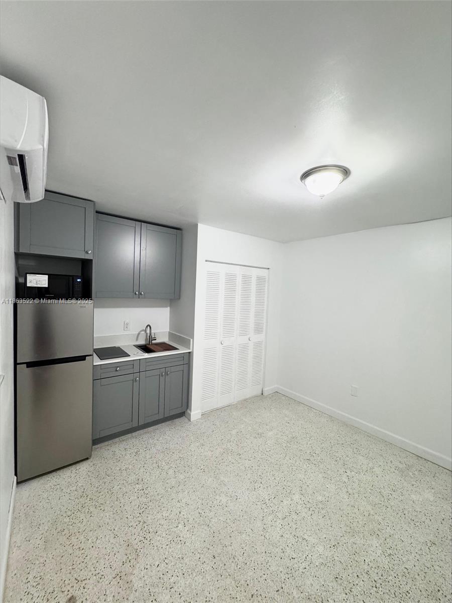 Charming and renovated studio efficiency for rent in the heart of Hialeah! This spacious 1-bath unit features granite floors, an updated kitchen, central A/C, and a private entrance for added comfort and privacy. Rent includes water and electricity, making it a convenient and affordable option. Two assigned parking spaces are provided for your convenience. Excellent location close to Miami, shopping centers, schools, and major highways with easy access for commuting. Move-in ready with only first month and one deposit required. Don’t miss the opportunity to live in a well-maintained multifamily property with everything you need. Call today for a private showing at (786) 381-0140.