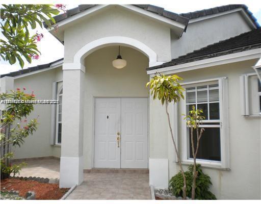 Spacious 4-bedroom, 2-bathroom single-family home with a 2-car garage. High ceilings and abundant natural light create an open, inviting feel. Tile throughout and wood flooring in the bedrooms. Storm shutters provide extra peace of mind. The primary suite featured a large walk-in closet, bathroom complete with double sinks, and a separate shower. This home offers the perfect balance for both relaxation and entertaining. Located near Zoo Miami, top restaurants, shopping centers, and with quick access to the Turnpike. NO association approval is required, so you can move in without delay!