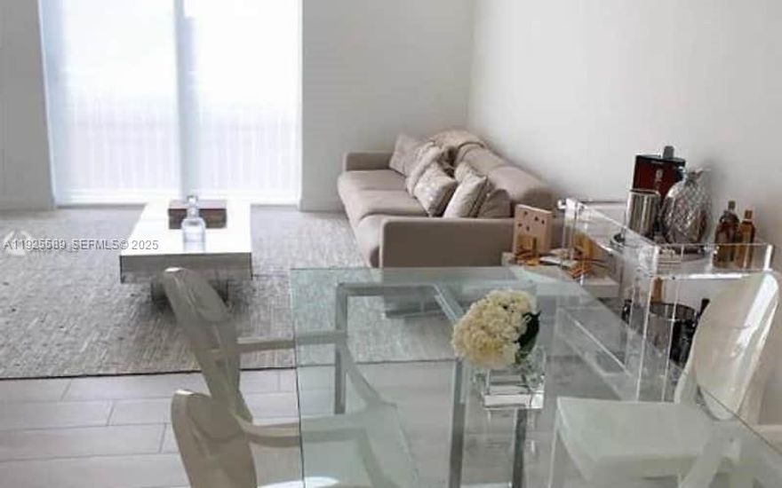 Amazing opportunity to live in Douglas Grand building in the heart of Coral Gables. Completely updated, professionally decorated unit with high-end finishes. Custom made closets, granite countertops, tile floors, washer/dryer inside unit in a secure building featuring, concierge, pool, and exercise room. Just minutes from Brickell, Coconut Grove, and Downtown Miami giving you access to the best Miami has to offer. Included is cable/internet and water, WiFi, swimming pool, and exercise room. Private garage parking as well. Also, there is a Publix on the ground floor of the building. If you'd like the unit un-furnished, can be accommodated as well.