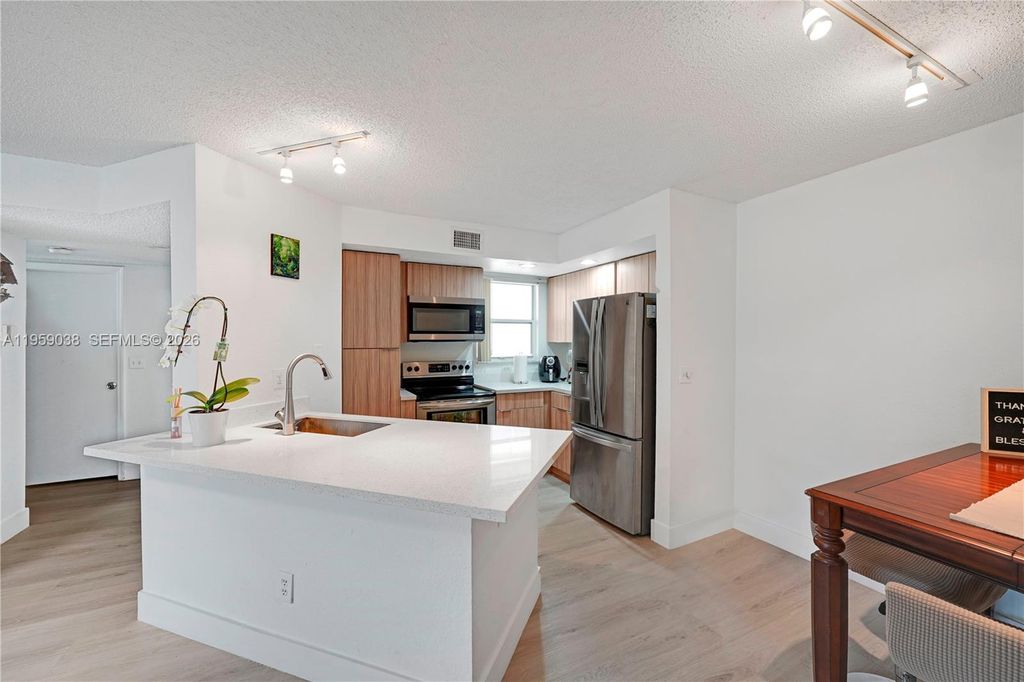 Photo of 437 Vista Isles Dr #2217, Sunrise, FL 33325 (MLS # A11959038)