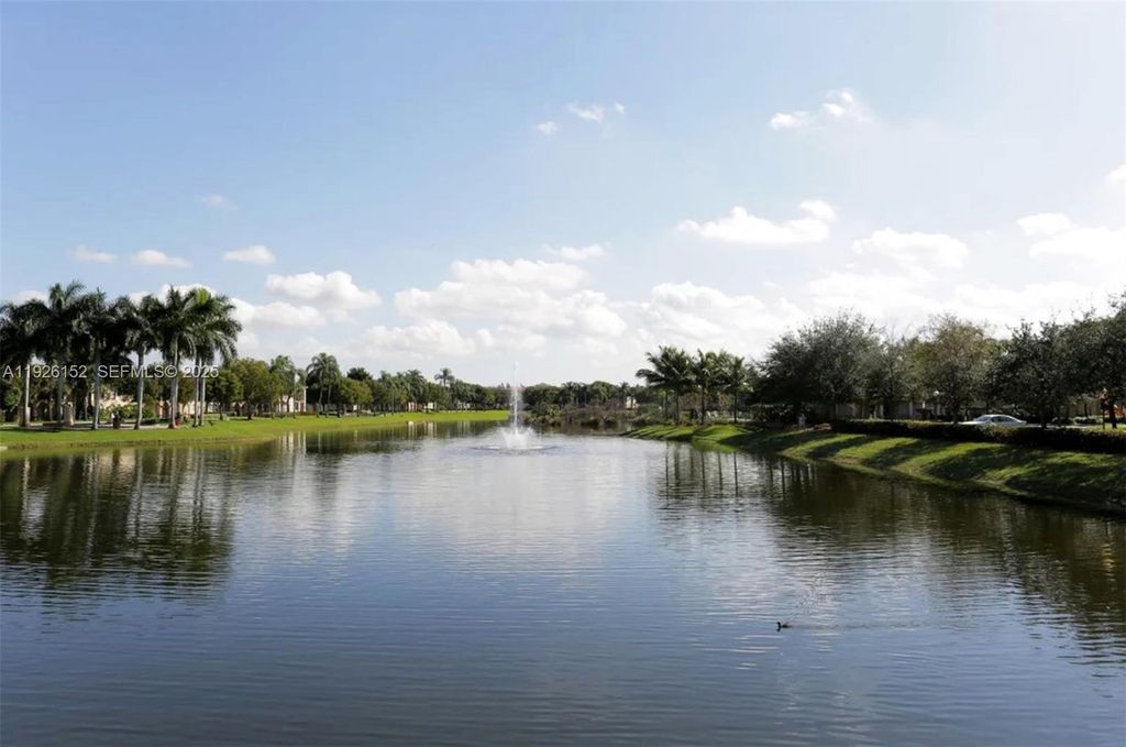 Photo of 2451 Centergate Dr #104, Miramar, FL 33025 (MLS # A11926152)