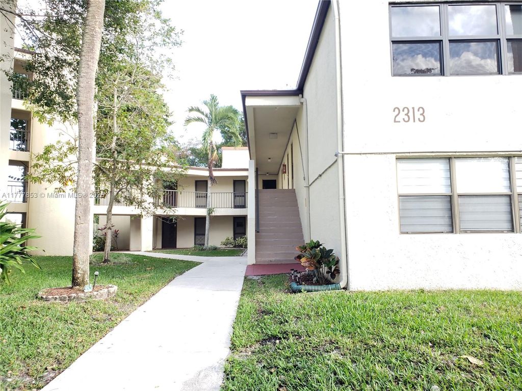 Photo of 2313 S Cypress Bend Dr #222B, Pompano Beach, FL 33069 (MLS # A11777853)