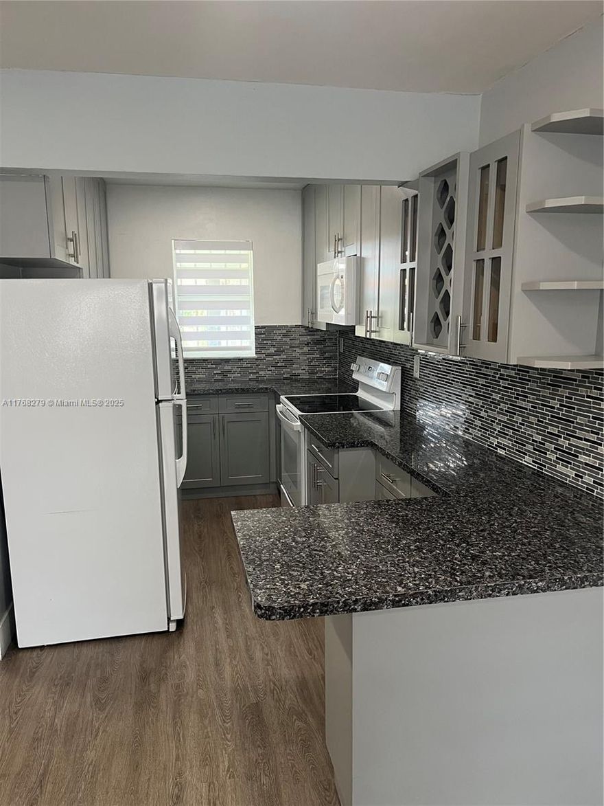 Unbeatable Location!! Charming first-floor apartment close to shopping, entertainment, work, public transportation, and Opa Locka Airport.  Located in a flood-protected area. Air conditioning was installed in 2021 and features an electric tankless water heater. The property is move-in ready and comes with appliances, making it easy to move in. Ideal for first-time buyers or as an investment.