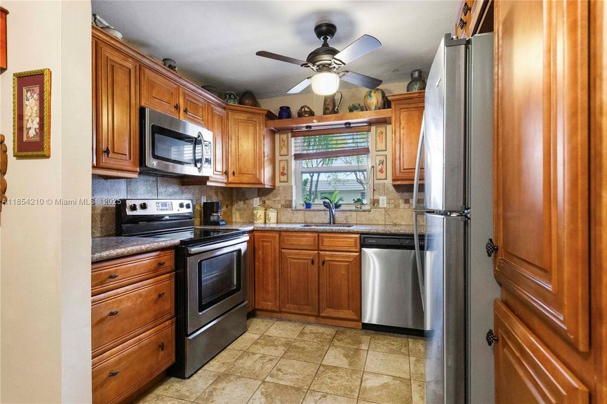 Purchase with 5% down.This well maintained 2-bedroom, 2-bathroom condo is located in a prime location with easy access to the beach, Young Circle, shopping, 9 hole golf course, and Fort Lauderdale Airport. Relax on the spacious screened patio. Inside, you'll find tile floors throughout, a kitchen boasting newer wood cabinets with ample storage, granite countertops and stainless steel appliances. Impact windows provide peace of mind. Community amenities include a BBQ area, swimming pool, and sauna. This condo welcomes all ages and small pets. Maintenance fees cover water, basic cable, and reserves plus more. Leasing is permitted after 18 months of ownership. New roof installed 2024.