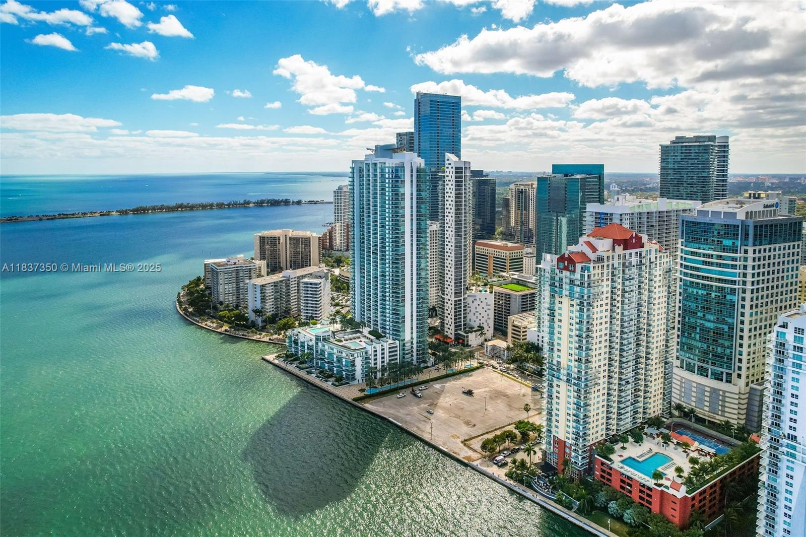 Welcome to The Mark on Brickell Bay Drive, where comfort meets convenience in this stylishly furnished 1-bedroom, 1-bath condo. Take in sweeping city views and ocean views from your private balcony. This updated unit features a modern kitchen with granite countertops, wood floors throughout, fully updated bathroom, an in-unit washer & dryer, and assigned parking plus valet service. Cable and internet are included for your convenience. Enjoy resort-style living with access to a waterfront restaurant, fitness center, 24-hour security, and concierge services. All just steps from the vibrant energy of Brickell. Book your private showing today and discover the best of Miami living.