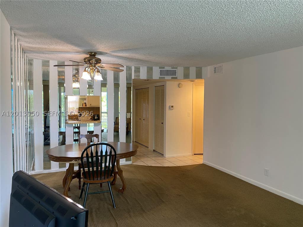 Photo of 9370 Sunrise Lakes Blvd #209, Sunrise, FL 33322 (MLS # A12013950)