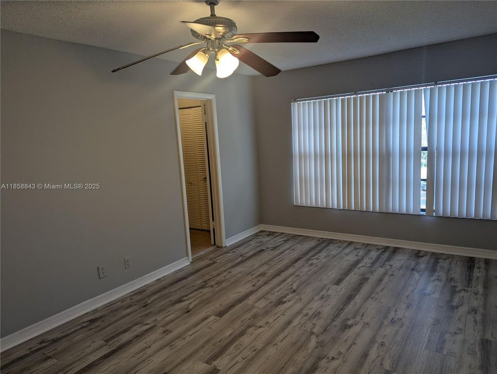 Photo of 2588 Coral Springs Dr #2588, Coral Springs, FL 33065 (MLS # A11858843)