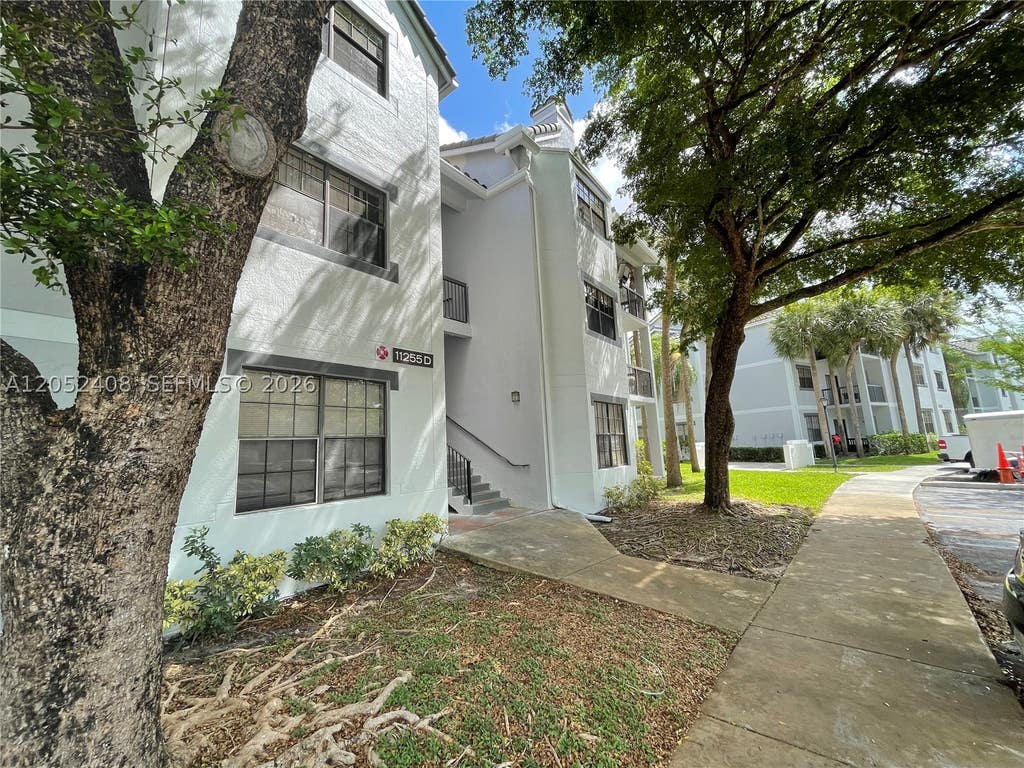 Photo of 11255 W Atlantic Blvd #106, Coral Springs, FL 33071 (MLS # A12052408)