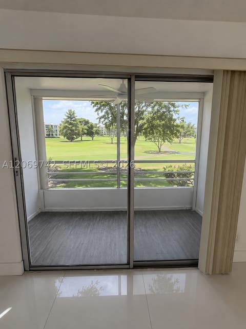 Photo of 500 SW 130th Ter #109A, Pembroke Pines, FL 33027 (MLS # A12069742)