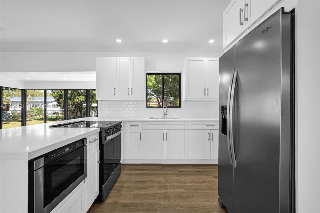 Photo of 211 S 57th Ter, Hollywood, FL 33023 (MLS # A11954621)