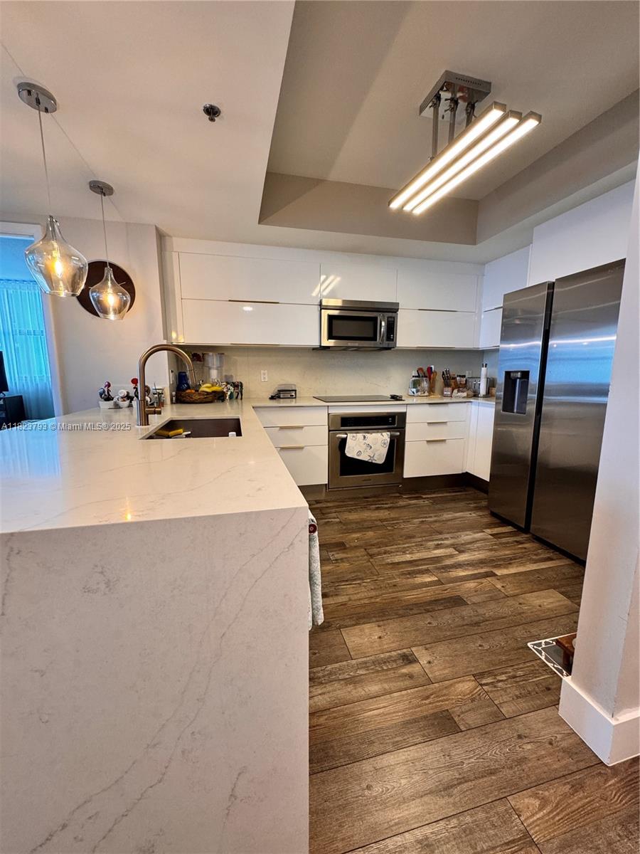 TAO SAWGRASS CONDOMINIUM - Residential