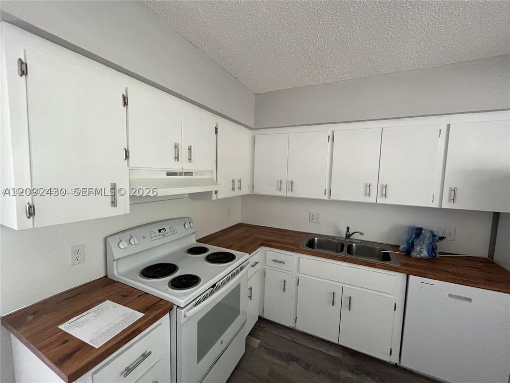 Photo of 3739 SE 15 St #2, Dania Beach, FL 33004 (MLS # A12092430)