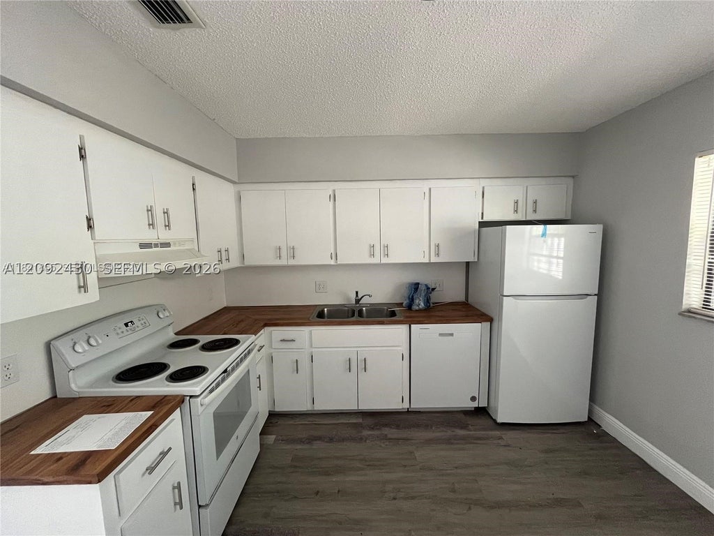 Photo of 3739 SE 15 St #2, Dania Beach, FL 33004 (MLS # A12092430)