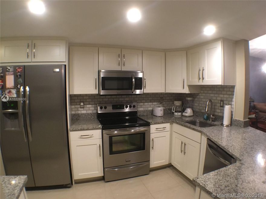 Skylake area - Completely updated & stylish condo with lake views in the Jade Winds gated community! Condo has 1 huge bedroom & 1-1/2 renovated bathrooms. Gorgeous open kitchen with white wood cabinetry, granite counters & new stainless steel appliances. Large tile flooring throughout the unit. Updated electrical & AC. Enclosed terrace with a beautiful view of the lake. No renting during the first 2 years. Pets are welcomed. Centrally located near highways, schools, restaurants, shopping & Aventura Mall.