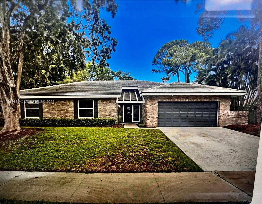 Photo of 2623 NW Timbercreek Cir #2623, Boca Raton, FL 33431 (MLS # A11801185)