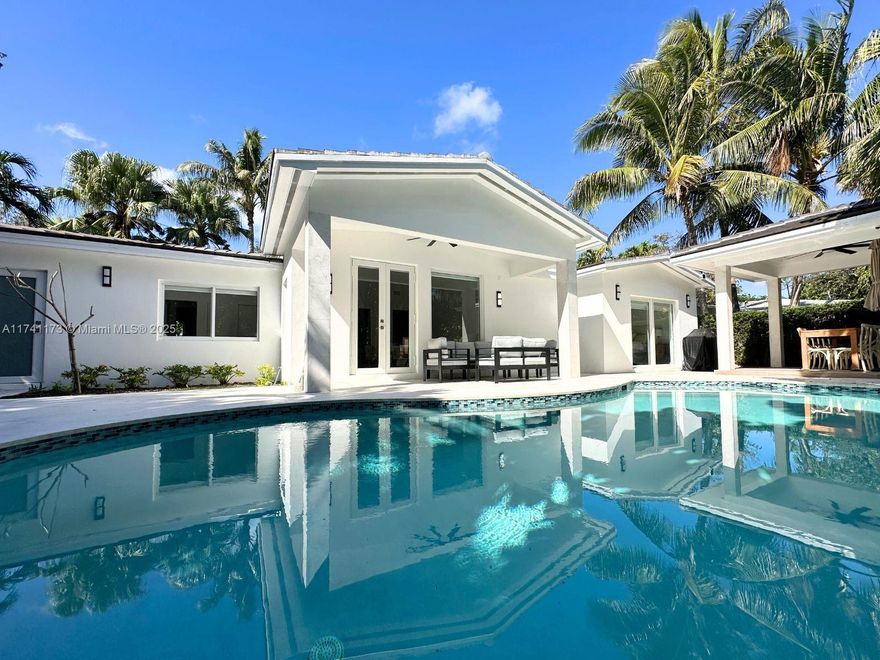 This beautifully house was fully rebuilt in 2021, undergoing an extensive renovation that included brand-new electrical and plumbing systems, a new roof, expanded living areas, impact-resistant windows, A/C system, energy-efficient lighting and pool area enhancements.
With 2,185 sq ft of living space on a 7,633 sq ft lot, this one-story home offers 4 bedrooms, 3 bathrooms, and a desirable split floor plan.
The kitchen boasts quartz countertops and high-end finishes, complemented by a laundry room, spacious and bright dining and living areas and porcelain wood plank flooring. 
The outdoor oasis is perfect for relaxation and entertaining, offering a big pool, a charming gazebo, and meticulously landscaped grounds. Nestled on a tranquil, low-traffic street, near beaches, parks and schools.