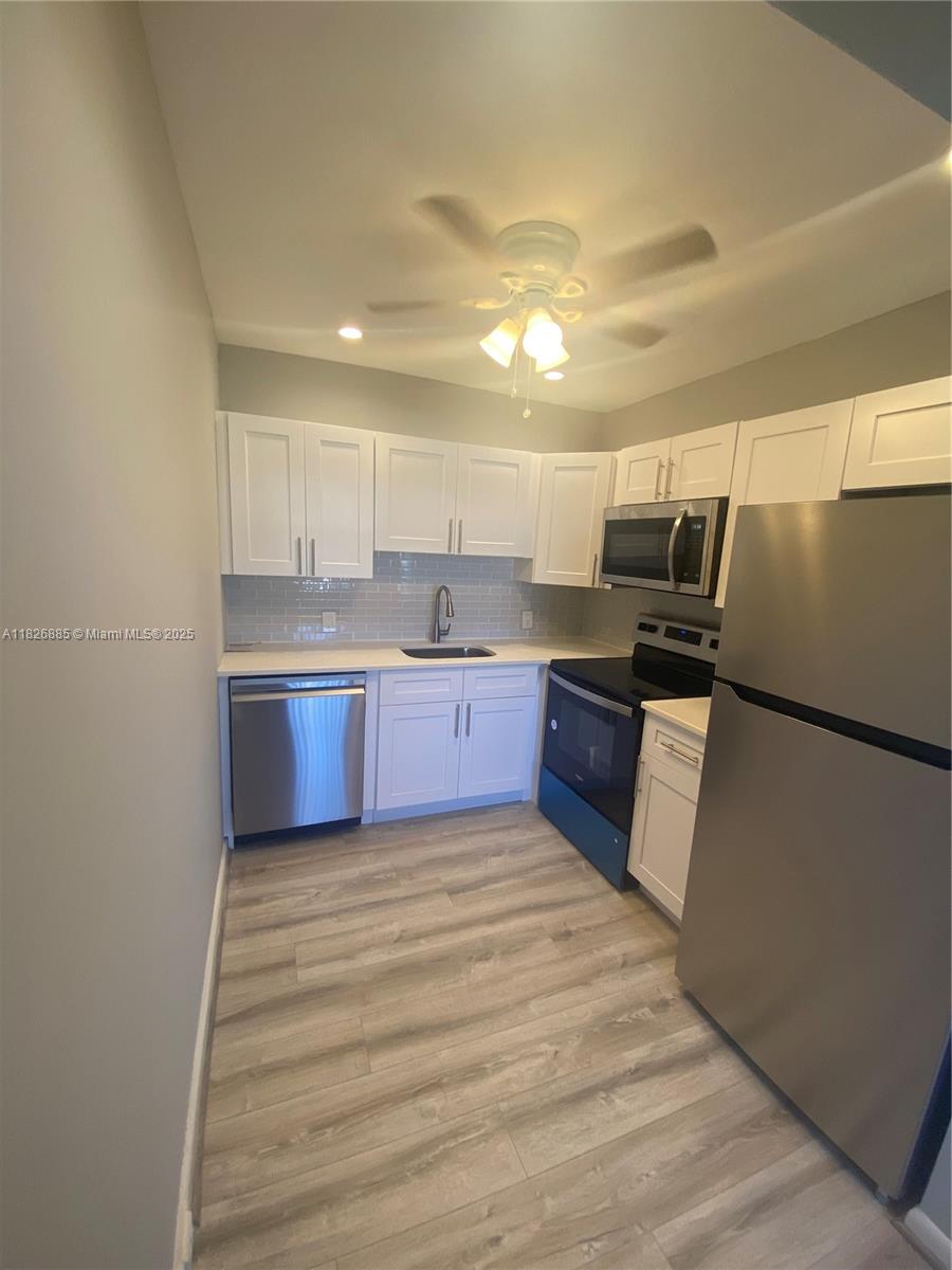 This Condo was COMPLETELY RENOVATED. New Kitchens, New Bathrooms, New Flooring. Stainless Steel Appliances, Walk-in Shower, Quartz countertops in Kitchen and both bathrooms, Garbage disposal Microwave, Refrigerator, Electric Range. Basic Cable and Internet Included! Fabulous clubhouse with amazing amenities. Convenient to plazas with supermarkets, Banks, restaurants, etc.