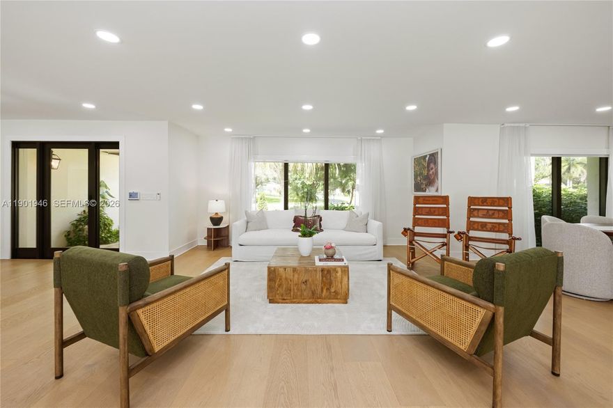 Homes are rarely available in SW Ranches' Ivanhoe Estates! This sanctuary sits on 1+ acre of manicured landscaping and fruit-tree splendor. Inside a fresh, contemporary vibe that flows effortlessly throughout the home. This 5/5 home features a primary suite PLUS two additional master bedrooms. The heart of the home: the great room-an open-concept that seamlessly integrates kitchen, dining, family and living spaces within once connected space. Luxury kitchen with Taj Mahal stone & high-end s/s appliances. A resort-style terrace with pool, oversized pergola and a full cabana bath! Move-in ready with impact windows/doors throughout, including garage. The split floor plan provides a perfect haven for multigenerational families, guest, or WFH professionals. Walkthru video available. Must see!