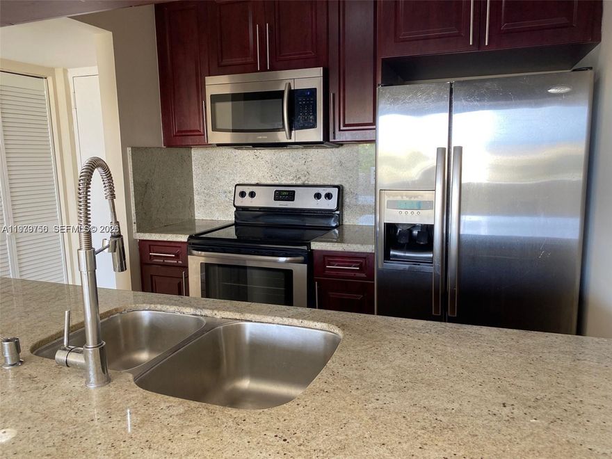 Renovated 2BR/1BA unit conveniently located off Kendall Drive. Open kitchen with granite counters and stainless steel appliances. Spacious, bright floor plan with tile and wood floors. Master bedroom features walk-in closets. In-unit washer and dryer.