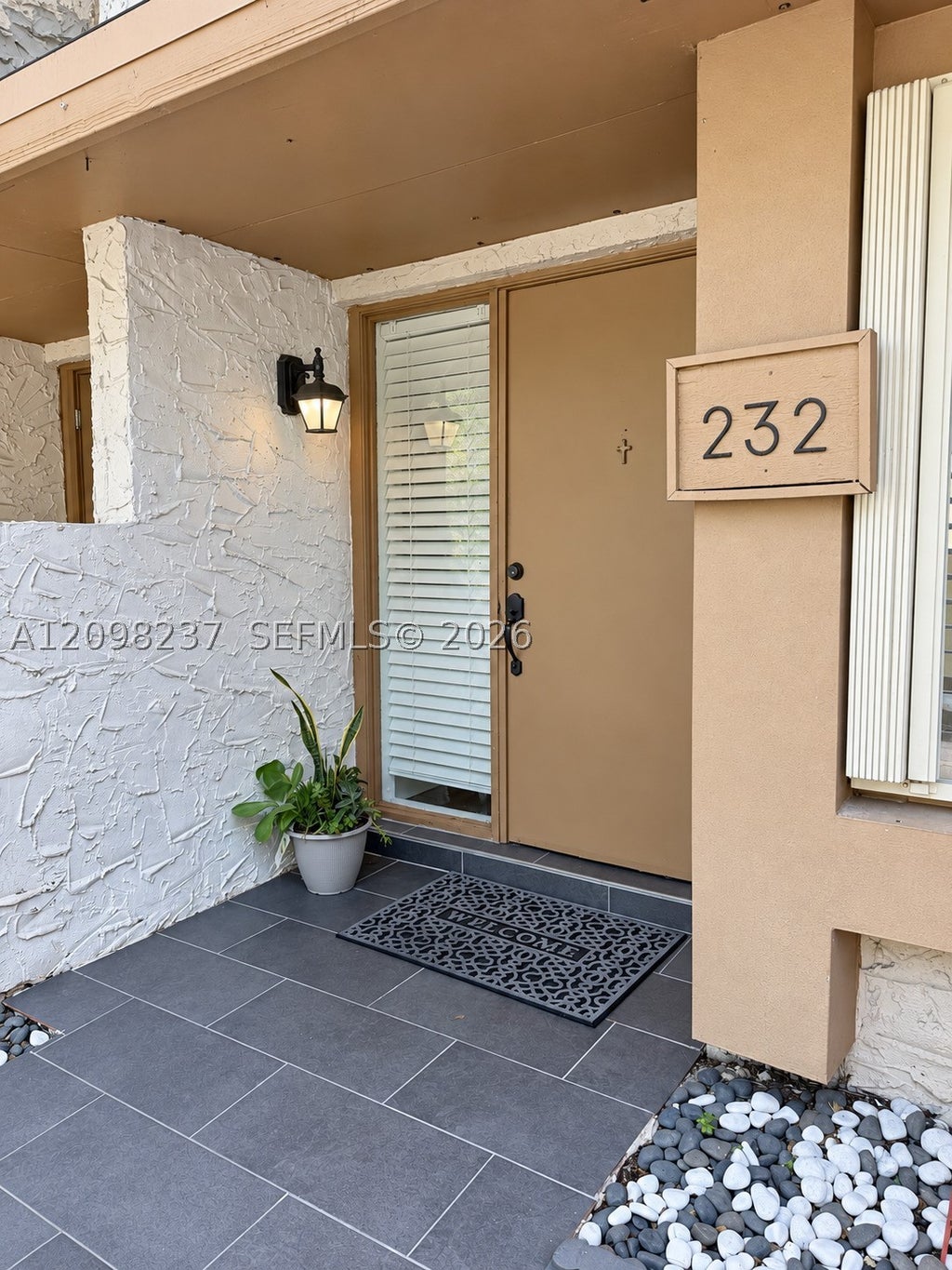 Photo of 232 Wimbledon Lake Dr #232, Plantation, FL 33324 (MLS # A12098237)