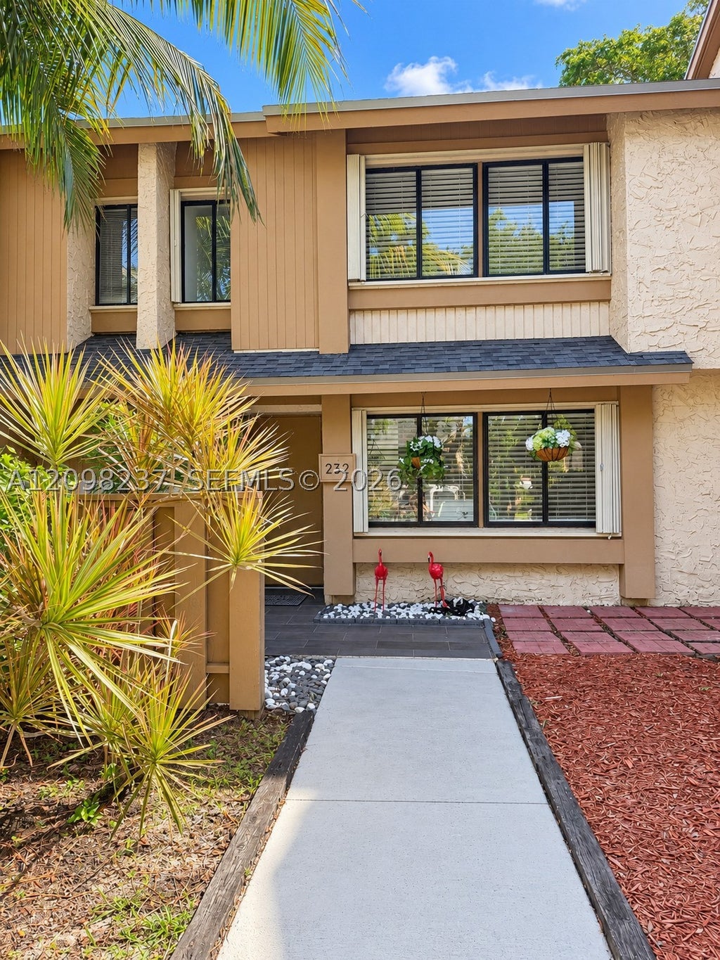 Photo of 232 Wimbledon Lake Dr #232, Plantation, FL 33324 (MLS # A12098237)
