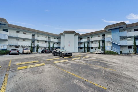 Photo of 1400 Tallwood Ave #207, Hollywood, FL 33021 (MLS # A12105246)